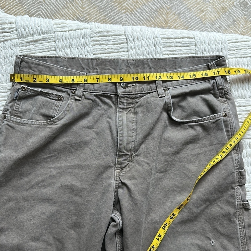 Carhartt distressed carpenter pants with some stains and holes. #10015 - Picture 10 of 11
